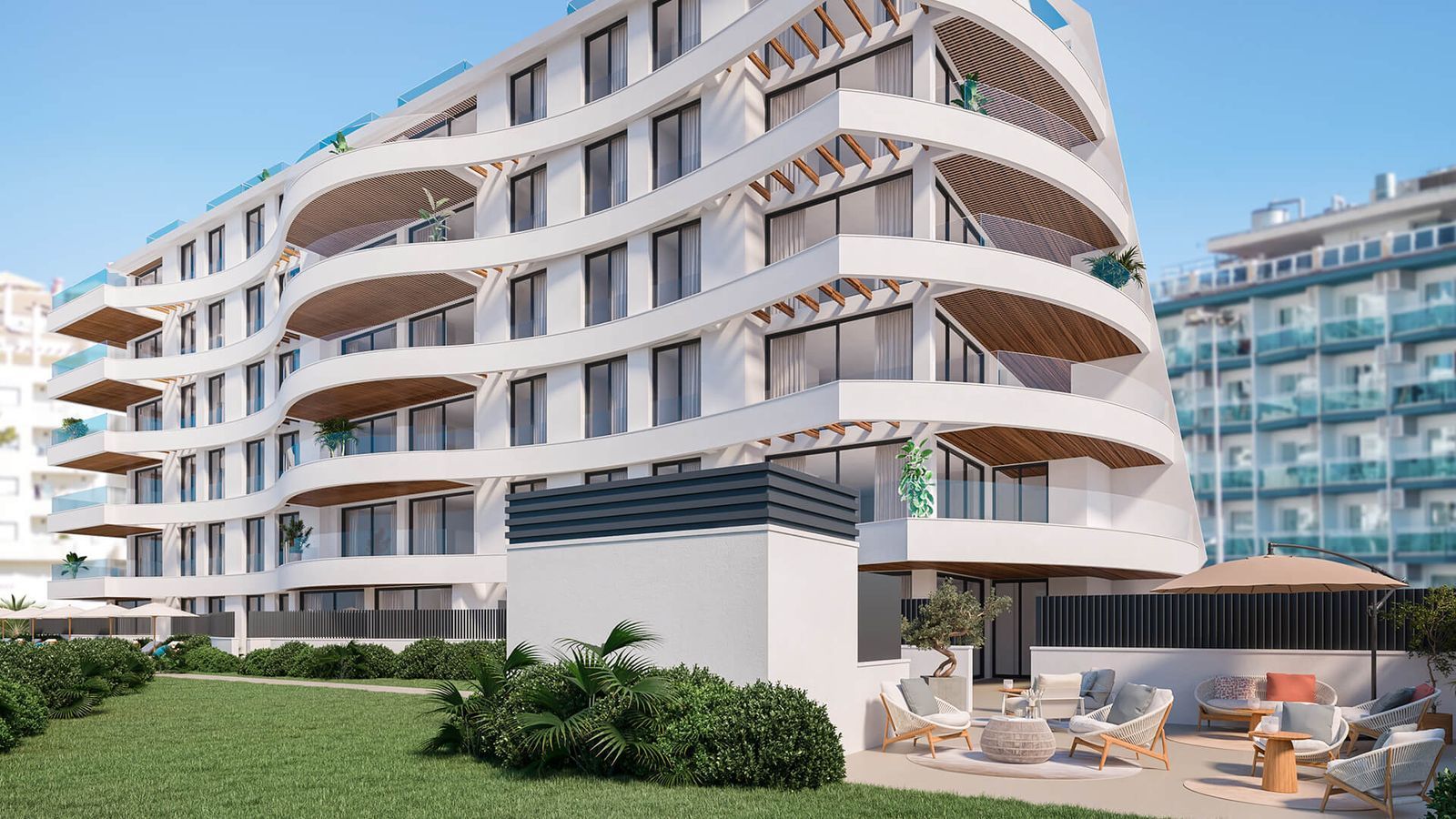 Exterieur van Marina Golden Bay met tuin en terras